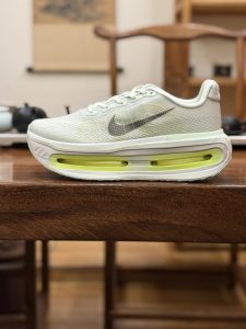 Nike Vomero Premium Green Road Running Shoes for Men and Women​