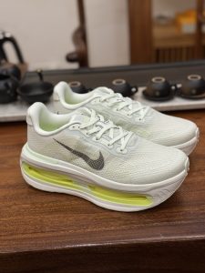 Nike Vomero Premium Green Road Running Shoes for Men and Women​
